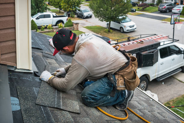 Professional Roofing technician working in Laurel, NY
